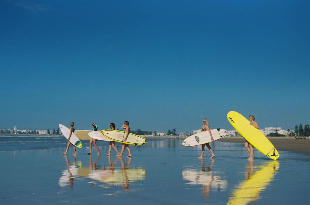 Girls going surfing