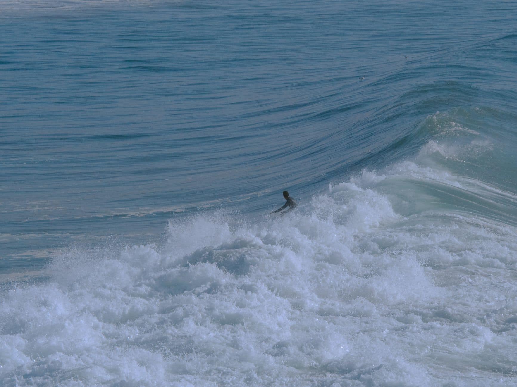 Catch the thrill of surfing in Taghazout's majestic waves. Ideal for adventure and travel seekers.